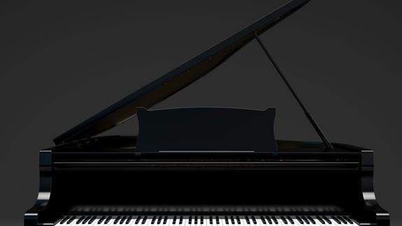 black gard piano on a dark background