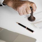 People checking bankbook isolated on white table. People checking bankbook isolated on white table