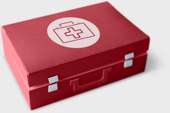 Healthcare concept word on a first aid box